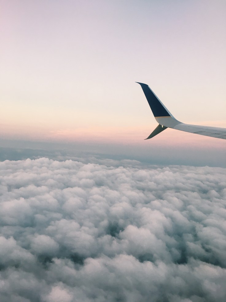 A plane flying over clouds.